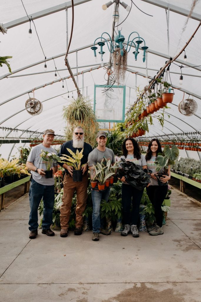 Groovy Plants Team holding plants