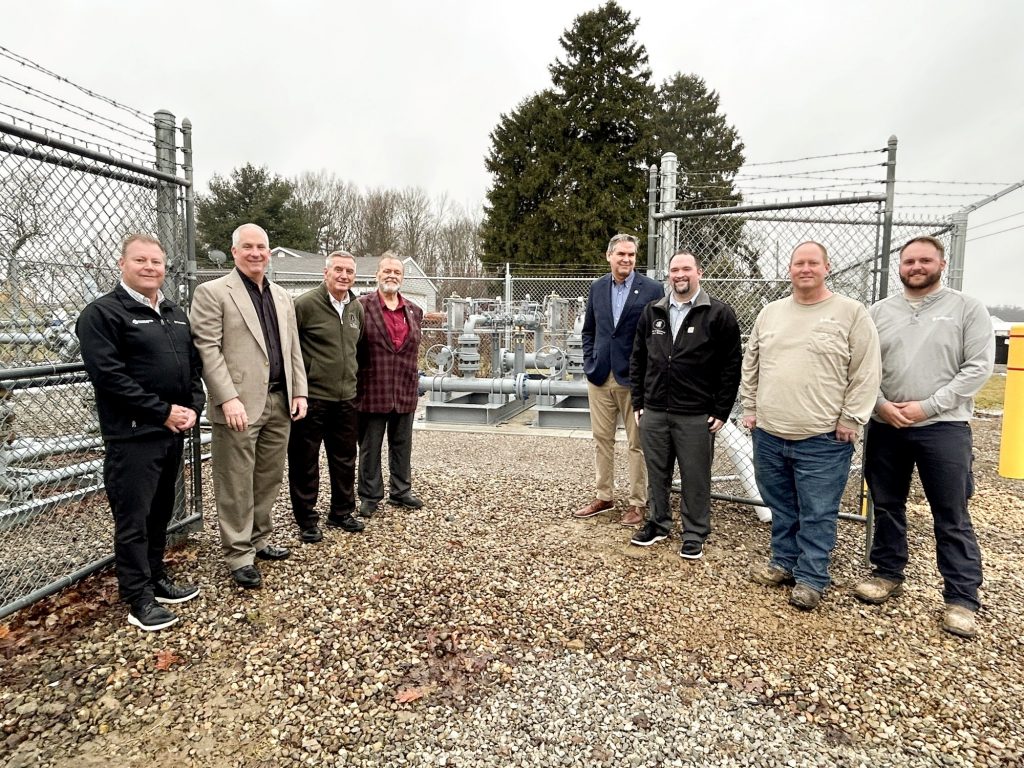 Consolidated and Morrow County Representatives in front of a portion of Consolidated's natural gas pipeline
