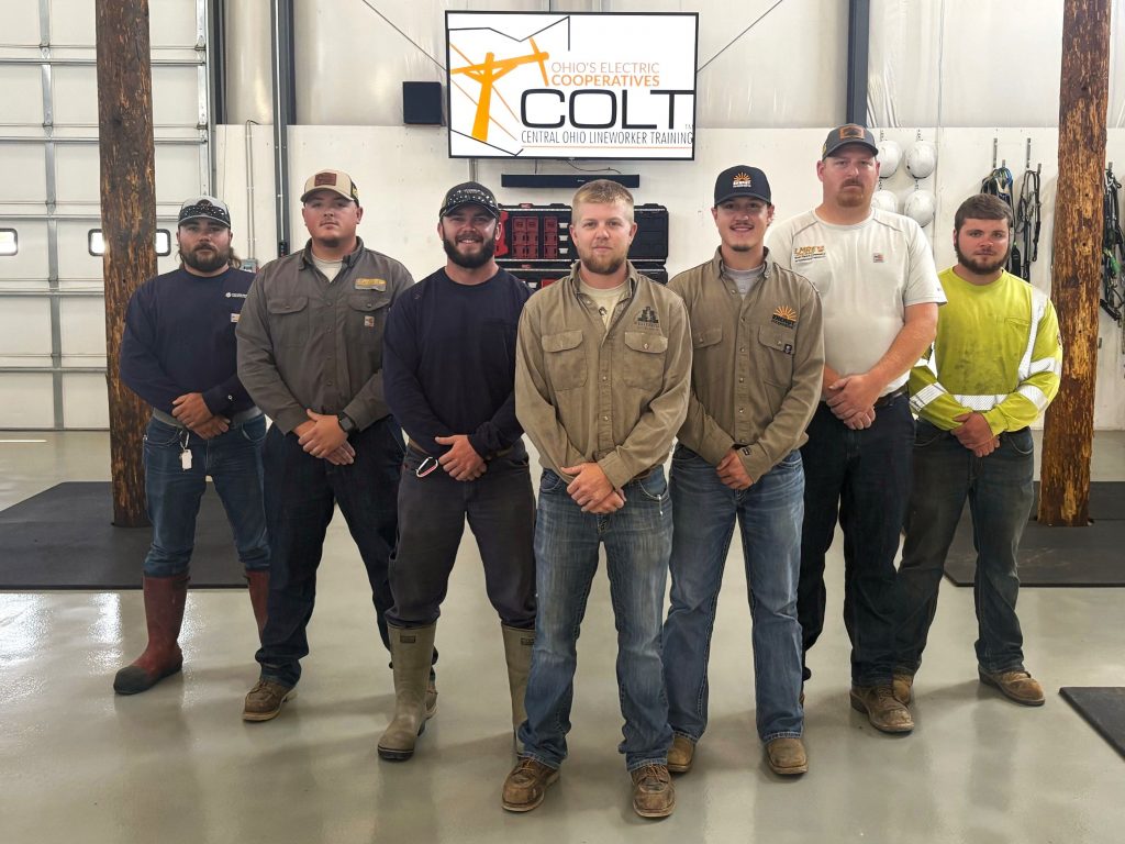 Photo of a group of lineworkers who graduated from COLT